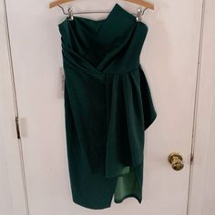 Nwt Dark Emerald Green Strapless Cocktail Dress Asymmetrical Neckline Bodycon Off Center Front Slit Bodice Is Lined Back Zipper Measurements Are Not Guaranteed. Length Is Measured From Center Of Back Neck Chest 15 1/2" Waist 13 1/2" Slit 13" Length 30" Keyword: Cocktail, Party, Event, Evening, Black Tie, Wedding, Bridesmaid, Homecoming, Holiday, Christmas, Forrest Green Strapless Casual Dress, Dark Emerald Green, Alexis Dress, Leather Midi Dress, Purple Cocktail Dress, Strapless Cocktail Dress, Gameday Dress, White By Vera Wang, Dress Asymmetrical