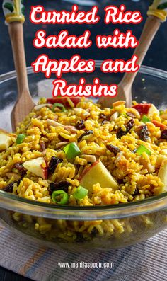 rice salad with apples and raisins in a glass bowl