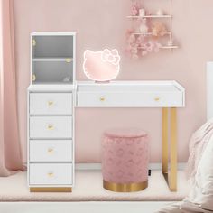 a pink bedroom with hello kitty decorations on the dresser and bed in front of it