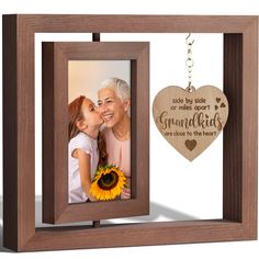 PRICES MAY VARY. MEANINGFUL GRANDMA CHRISTMAS GIFTS: Imaging your grandma are opening a surprise from you? Each crafted Heart Pendent in unique graphic design are engraved with touching words “side by side or miles apart grandkids are close to the heart” to express your love and appreciation to your grandma. Come with an elegant gift box, the wooden grandma picture frame Grandmother Christmas Gifts is a thoughtful gift for grandma, Nana, granny, Grandmy,Mimi,Gigi from granddaughter grandson grandkids. TIMELESS CHRISTMAS GIFTS FOR GRANDMA NANA GIFTS: Creative Design to record sweet love to your grandma! This Grandmother Christmas Gifts grandkids photo frame features a rotating picture frame for 4x6 photo, allows 360°free rotation, and a sweet heart-shape ornament with warm words for hanging Meaningful Mom Gifts, Grandkids Pictures, Grandma Picture Frame, Nana Birthday Gift, Nana Christmas Gifts, Dad Pictures, Aunt Birthday Gift, Heart Pendent, Mother Pictures