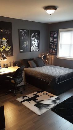 a bedroom with a bed, desk and two pictures on the wall