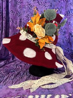 Witch Hat - Witch's Hat - Mushroom Witch Hat - Floral Hat - Flower Hat - Mushie - Mushroom Hat - Mushroom Witch Hat - Red Witch Hat - Witchy One of a kind witch hat!  READY TO SHIP TODAY!  This beautiful piece is a scarlet red colored knit hat, hand painted with mushroom polka dots and hand stitched with antique lace ribbon and faux autumn florals! The left side of the hat has a large bunch of autumn flowers and greens for a beautiful POP of color, perfect for the season! The back of the ribbon is tied and stitched in a cute little lace waterfall that trails over your back.  Perfect for any spooky season or witchy party or even as a cute summer garden hat! I can also make custom hats, if you are looking for anything particular or special! Feel free to message me anytime! PLEASE ASK ANY QUE Red Witch Hat, Mushroom Witch Hat, Witchy Party, Mushroom Witch, Witchs Hat, Autumn Florals, Red Witch, Hat Flower, Gardening Hat