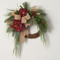 a christmas wreath hanging on the wall