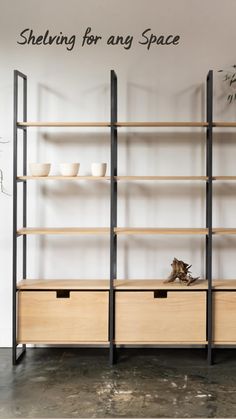 a shelf with two drawers and some plants