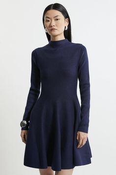 Invest In Knitwear This Cooler Season With This Timeless Dress. Crafted From Sumptuous Viscose Blend, Adorned With A Cable Knit Texture For Contrasting Detail. Featuring A Modest Funnel Neck, Long Sleeves And A Full Skirt For Feminine Flair. Pair This Piece With Boots For A Dress That Can Go From Desk To Dinner.Cable Knit Printfunnel Necklong Sleevesviscose Bride Jumpsuit, Petite Wedding Guest Dresses, Sequin Coats, Tall Skirt, Winter Coat Dress, Plus Size Workwear, Tall Dresses, Italy Outfits, Knit Texture