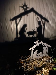 a nativity scene with the birth of jesus and baby jesus in the manger