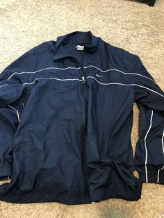 Nike Zip-Up Navy Blue White Stripe Jacket Adult XXL Great Shape The item is in used but great condition, and is from a non-smoking home. Shipping is only $2.99 for single shirt purchased. LOVE to combine shipping. Each additional shirt only .50 cents extra. So check out my new store filled with vintage and hard to find t-shirts. Thanks for viewing! Nike Long Sleeve Windbreaker With Pockets, Nike Blue Outerwear For Fall, Blue Nike Outerwear For Fall, Nike Long Sleeve Navy Track Jacket, Nike Casual Long Sleeve Sport Coat, Casual Nike Sport Coat With Long Sleeves, Nike Casual Navy Track Jacket, Casual Navy Nike Track Jacket, Blue Long Sleeve Sport Coat