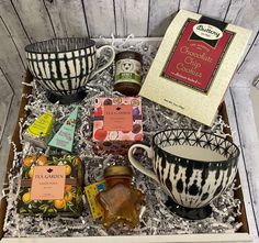 the tea and cookies gift box is filled with treats