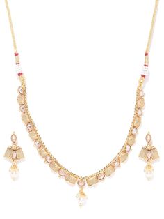 This jewellery set consists of a necklace and a pair of earringsHandcrafted necklace, gold-plated, has artificial stones and beads, secured with drawstring closureA pair of matching drop earrings, secured with a post-and-back closure Size & Fit Length of necklace : 40 cmLength of earrings: 4 cm Material & Care Material: BrassPlating: Gold-platedStone type: Artificial stones and beads Care InstructionWipe your jewellery with a soft cloth after every useAlways store your jewellery in a flat box to avoid accidental scratchesKeep sprays and perfumes away from your jewelleryDo not soak your jewellery in waterClean your jewellery using a soft brush, dipped in jewellery cleaning solution only Dispatch within 7 days Festive Jewelry Sets With Dangling Beads For Celebration, Gold Jewelry Sets With Dangling Beads For Party, Gold Party Jewelry Sets With Dangling Beads, Festive Gold Kundan Necklace With Dangling Beads, Festive Gold Dangle Necklaces, Festive Gold Jewelry With Dangling Beads, Gold Jewelry With Dangling Beads For Festive Occasions, Gold Kundan Necklace With Dangling Beads, Traditional Gold Dangle Beaded Necklaces