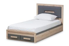 a bed with two drawers underneath it and a white blanket on the bottom one side