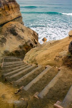 there is a set of stairs going up to the beach