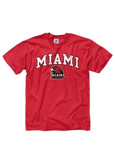 Show off your team pride in this Miami Redhawks Red Arch Logo Short Sleeve T Shirt! This Miami of Ohio Short Sleeve Tee features a screen printed team wordmark and logo. Make sure everyone knows you root for the Redhawks with this Red Miami of Ohio T Shirt. Go Redhawks! Classic Fit, Tubular construction, Taped neck and shoulders, Quarter-turned to eliminate center crease, Unisex, Fit: True to Size, 100% Cotton Collegiate Red Fan Gear T-shirt, Red Collegiate Fan Gear T-shirt, University Red Cotton T-shirt With Team Name, University Red T-shirt For Fan Merchandise, University Red Cotton T-shirt With Team Logo, Collegiate Red T-shirt For College, Red Collegiate T-shirt For College, University Red Pre-shrunk Collegiate T-shirt, Pre-shrunk University Red T-shirt For College