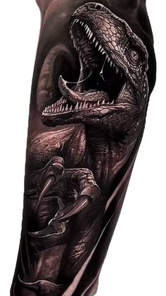 a man with a tattoo on his arm that has an image of a dinosaur in it