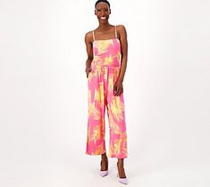 A fashionista favorite for its versatility, this cropped jumpsuit boasts removable straps, making it beachy keen choice for seaside celebrations, backyard barbecues, and Sunday brunches. From Belle by Kim Gravel. Strapless Jumpsuit For Spring Day Out, Chic Summer Jumpsuits And Rompers With Spaghetti Straps, Chic Jumpsuits And Rompers With Spaghetti Straps For Summer, Chic Summer Jumpsuit With Spaghetti Straps, Chic Jumpsuits And Rompers With Adjustable Straps For Vacation, Chic Spaghetti Straps Jumpsuits And Rompers For Summer, Spring Vacation Jumpsuits And Rompers With Adjustable Straps, Trendy Beach Overall Jumpsuits And Rompers, Chic Beach Jumpsuits And Rompers With Adjustable Straps