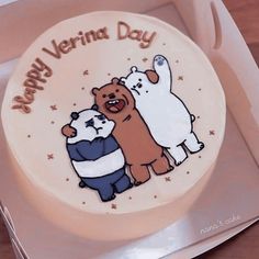 there is a cake with two bears on it