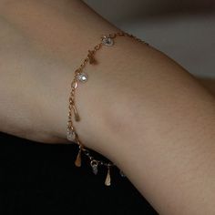 Elegant Sparkling Rose Gold Bracelet, Elegant Rose Gold Tarnish Resistant Charm Bracelet, Delicate Gold-plated Bracelet Tarnish Resistant, Delicate Gold-plated Tarnish-resistant Bracelet, Dainty Gold Sparkling Bracelet, Elegant Gold Dangle Charm Bracelet, Delicate Hypoallergenic Gold Plated Bracelets, Gold Party Bracelet With Oyster Detail, Dazzling Gold Bracelet As Gift