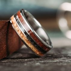 two rings with different colored wood in them