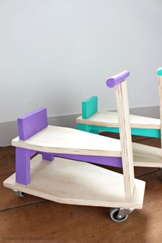 two children's wooden toys sitting on top of each other