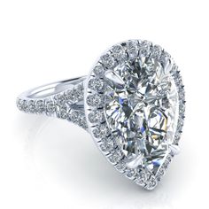 an oval cut diamond ring with double halos