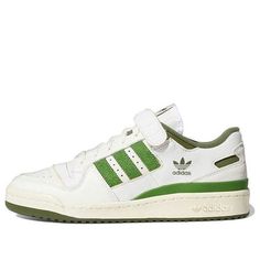 Looking for a versatile, low-profile sneaker that will take your style up a notch? Check out the Adidas Forum 84 Low in White Crew Green. This retro-inspired sneaker features a simple, two-tone colorway that is perfect for any outfit. The leather upper is in a subtle Cloud White finish, with hairy suede three-stripes in a lush green hue. The terry lining and rubber outsole are in a more subdued shade of olive green, and the rubber midsole is off-white. The EVA wedge is exposed on the medial side, adding a touch of style to this already fashionable sneaker. Whether you're hitting the court or just running errands, the Adidas Forum 84 Low is a must-have sneaker for any fan of the game. (SNKR/Skate/Light/Unisex/Low Top/Non-Slip) Green Sneakers With Three Stripes And Round Toe, Green High-top Sneakers With Three Stripes, Green High-top Sneakers With Three Stripes Branding, Adidas Low-top Skate Shoes With Three Stripes, Low-top Green Sneakers With Three Stripes Branding, Green Low-top Adidas Skate Shoes, Green Skate Shoes With Three Stripes And Round Toe, Green Skate Shoes With Three Stripes Branding, Adidas Green Low-top Custom Sneakers