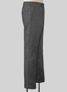 Celebrate in style at your next special event with our Gray Highland Tweed Trousers. Crafted from pure wool, the gray trousers are a truly luxurious choice to change your sartorial tradition. 
 
 Look Includes  Gray Tweed Fabric  Cross Pocket  Forward 2 Pleats  Side Tabs (No Loops)- Arrow Shape  Bottom Cuff (1.5")  Two Welted Back Pockets on Trousers   
 You can change the look during customization if required. 
 
 Lining: Viscose, Dry Clean. Elegant Tweed Pants For Winter, Formal Tweed Pants With Herringbone Pattern, Classic Tweed Pants For Work, Elegant Tweed Pants For Business, Elegant Gray Wool Bottoms, Tailored Tweed Pants For Formal Occasions, Classic Wool Dress Pants For Winter, Elegant Gray Wool Pants, Elegant Wool Pants With Herringbone Pattern