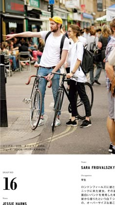 a man and woman standing next to each other on the street with a bike in front of them