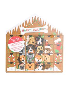 a wooden calendar with dogs and christmas decorations on it's front cover, which reads happy pawdays