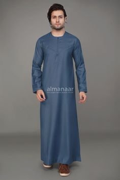 These Omani Thobes are created from high-grade cotton blends that we carefully selected to assure their great quality. The fabric we chose is a luxurious fabric that feels wonderful against the skin. The front of these Collarless Thobes is zipped, and there are side pockets. It has a traditional style and is suitable for everyday wear as well as special occasions such as Eid or a Nikah. Product Specifications: The neckline is collarless, with a zipped front and two side pockets. Please Note: Pro Arab Men Fashion, Islamic Store, Light Sky Blue, Black Sky, Arab Men, Clothing Styles, Mens Clothing, Luxury Fabrics, Men Fashion