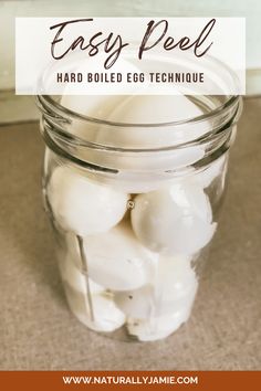 a glass jar filled with white marshmallows and text overlay reads easy peel hard boiled egg technique