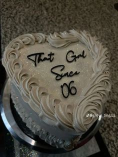 a heart shaped cake with the words that got she 60 written on it