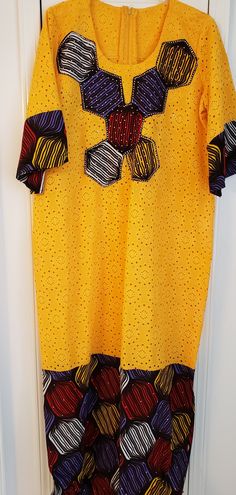 Net Lace With Stones Ankara Print Free Flowing African Outfit Yellow Tunic Maxi Dress For Spring, Yellow Short Sleeve Midi Dress, Traditional Yellow Maxi Length Kaftan, Traditional Yellow Maxi Kaftan, Yellow Tunic Maxi Dress, Traditional Yellow Tunic Kaftan, Traditional Yellow V-neck Maxi Dress, Free Gown, Ankara And Lace