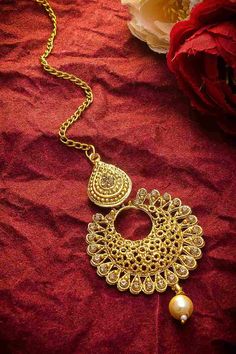 Product Features:   Color: Gold Material: Alloy Product Weight: 75 Gram Occasion: Party Wear Disclaimer: There will be slight difference in digital to actual image Gold Maang Tikka, Mang Tikka, Maang Tikka, Yellow Ties, Stone Studs, Cz Diamond, Golden Color, Gold Style, Gold Material