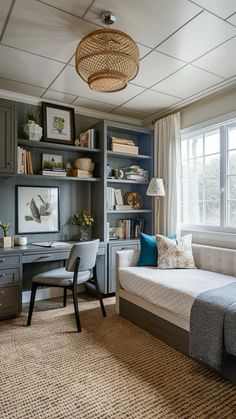 a bedroom with a bed, desk and shelves filled with bookshelves next to a window