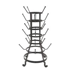 a metal rack with multiple shelves on it