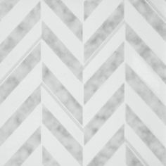 a white marble chevroned pattern with grey stripes