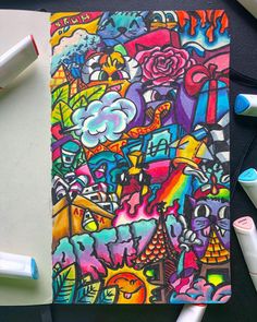 an art journal with colorful graffiti on it