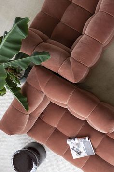 an overhead view of a living room couch and coffee table