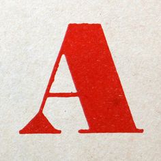 the letter a is made up of red paper