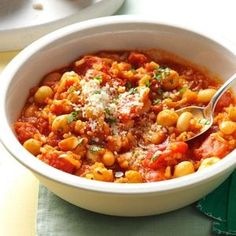 a white bowl filled with pasta and cheese