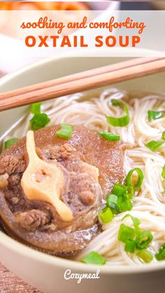 a bowl filled with noodles and meat next to chopsticks