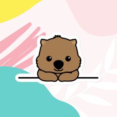 a brown bear sitting on top of a sticker