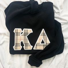 8.0 oz., 50% cotton / 50% polyester pre-shrunk fleece knit. Letters are embroidered. Black College Sweatshirt With Embroidered Graphics, Black Embroidered Sweatshirt For College, Black Casual Sweatshirt With Letter Embroidery, Sporty Black Embroidered Sweatshirt, Fall Streetwear Sweater With Letter Embroidery, Black Sweater With Letter Embroidery For Winter, Black Cotton Sweater With Letter Embroidery, Casual College Sweatshirt With Custom Embroidery, College Cotton Sweater With Embroidered Graphics