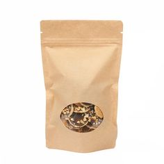 a brown bag filled with nuts on top of a white background