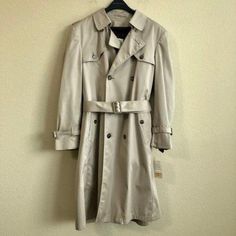 Vintage London Towne Lined Button Down Belted Trench Coat. Size 40r. New With Tags. Classic Khaki Outerwear For Office, Business Khaki Outerwear With Buttons, Classic Khaki Office Outerwear, Classic Cream Outerwear For Fall, Classic Spring Outerwear With Button Closure, Classic Outerwear With Lapel Collar In Neutral Color, Classic Khaki Pea Coat With Double Button Closure, Classic Neutral Outerwear With Lapel Collar, Fall Business Cream Outerwear