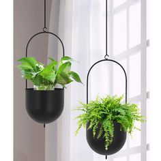 PRICES MAY VARY. SET OF 2 HANGING POTS: This hanging plant pots adopts a hanging design, and there is an elaborate ring design at the bottom of the hanging planters pots, so you can also connect down to other hanging pots, a variety of green plants grow together, saving space and make the whole home look more layered BEAUTIFUL and DURABLE MATERIALS: the metal hanging planter is made of black metal paint. Compared with other materials, it is not only simple and beautiful, but also has the characteristics of anti-fall, corrosion resistance and easy cleaning. Our ibigbean is more refined in the work of metal hanging pots. Finely polish the inner and outer surfaces to make the hanging pot look smoother and more textured. With the plants or flowers you like, which must be the first choice for d Metal Plant Hangers, Metal Hanging Planters, Hanging Planters Indoor, Small Flower Pots, Hanging Design, Plant Stand Indoor, Modern Planters, Ceiling Hanging, Metal Planters