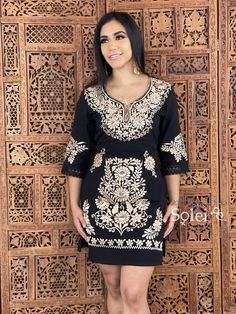 This Beautiful Floral Golden Embroidered Dress is the perfect formal dress. It's embroidered from top to bottom with gold florals and has details in lace and crochet. It also has ties in the back of the dress for a tighter look if desired. Please Note: You may purchase the dress with a belt for a special price or you can purchase the dress without the belt. The accessories you can buy and find in this link https://www.etsy.com/es/listing/637147293/filigrana-redonda-filigrana-clasica?ref=shop_hom Fitted V-neck Dress With Embroidered Neckline, Traditional Fitted Dress With Gold Embroidery, Fitted Embroidered Tunic Dress In Traditional Style, Fitted Traditional Embroidered Tunic Dress, Festive Embroidered Tunic Dresses, Elegant Tunic Dress With Embroidered Neckline, Elegant Dresses With Resham Embroidery And Short Sleeves, Festive Fitted Embroidered Tunic Dress, Fitted Dresses With Resham Embroidery