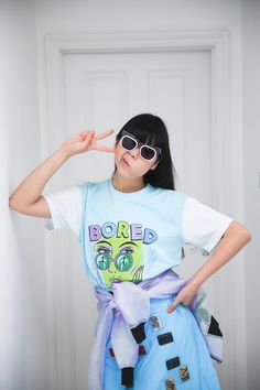 Emma Mulholland Bored t-shirt, Emma Mulholland x Pared sunglasses, Toga skirt, Bubbles Tokyo iridescent jacket around waist, Emma Mulholland sequin socks, Mother of Pearl slip-ons Sequin Socks, Jacket Around Waist, Iridescent Jacket, Susie Lau, Susie Bubble, Style Bubble, Style Star, Slip Ons, Star Fashion