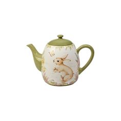 a tea pot with a rabbit on it