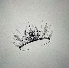 a black and white drawing of a crown with feathers on it's headband