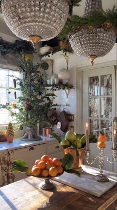 a kitchen filled with lots of different types of fruit on top of a wooden table